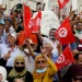 Tunisian opposition defies protest ban, rallies against president