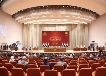 The Iraqi parliament postpones a session to vote on the election law, and protesters threaten to escalate