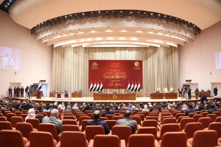The Iraqi parliament postpones a session to vote on the election law, and protesters threaten to escalate